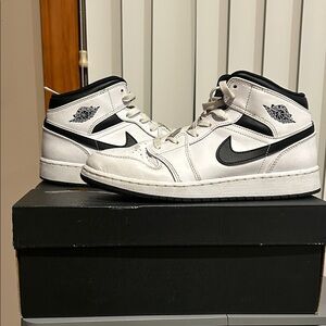 Air Jordan’s Boys White and Black High-Top Sneakers